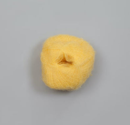 Rauma Plum – 70 % Super Kid Mohair / 30 % Polyamid – 25 g ≈ 250 m - utgående garn